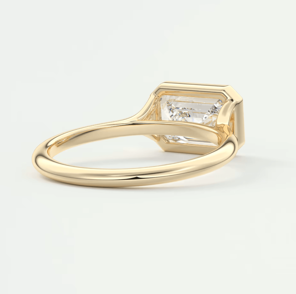 Aeris East-West Emerald Bezel Engagement Ring – Lab Diamond or Moissanite