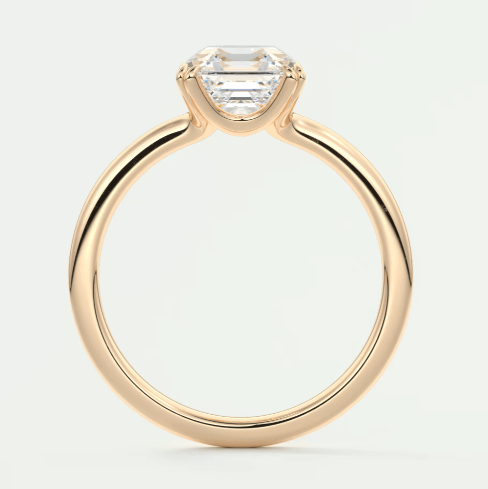 18-karat gold engagement ring with a princess-cut diamond.