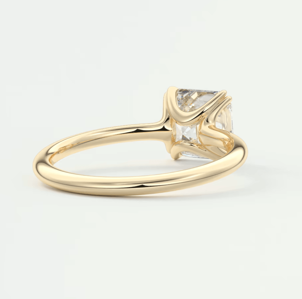 18k yellow gold princess cut diamond engagement ring.