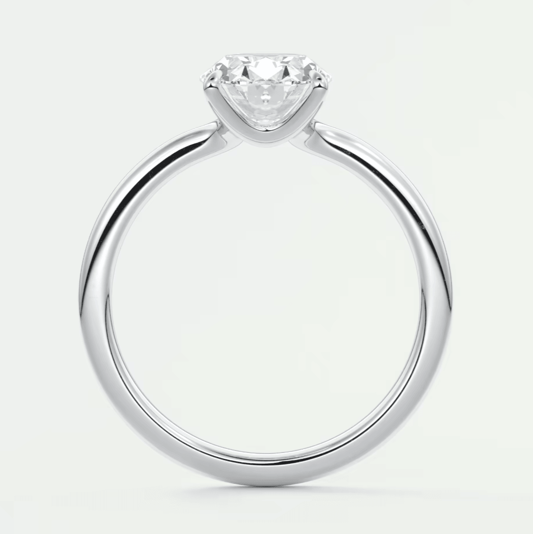 18k white gold solitaire diamond engagement ring.