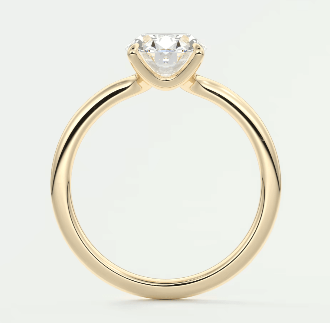 18k yellow gold engagement ring with a princess cut diamond.
