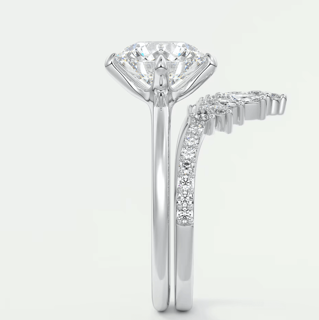 18k white gold diamond engagement ring with a princess cut center stone and pave set diamonds on the band.