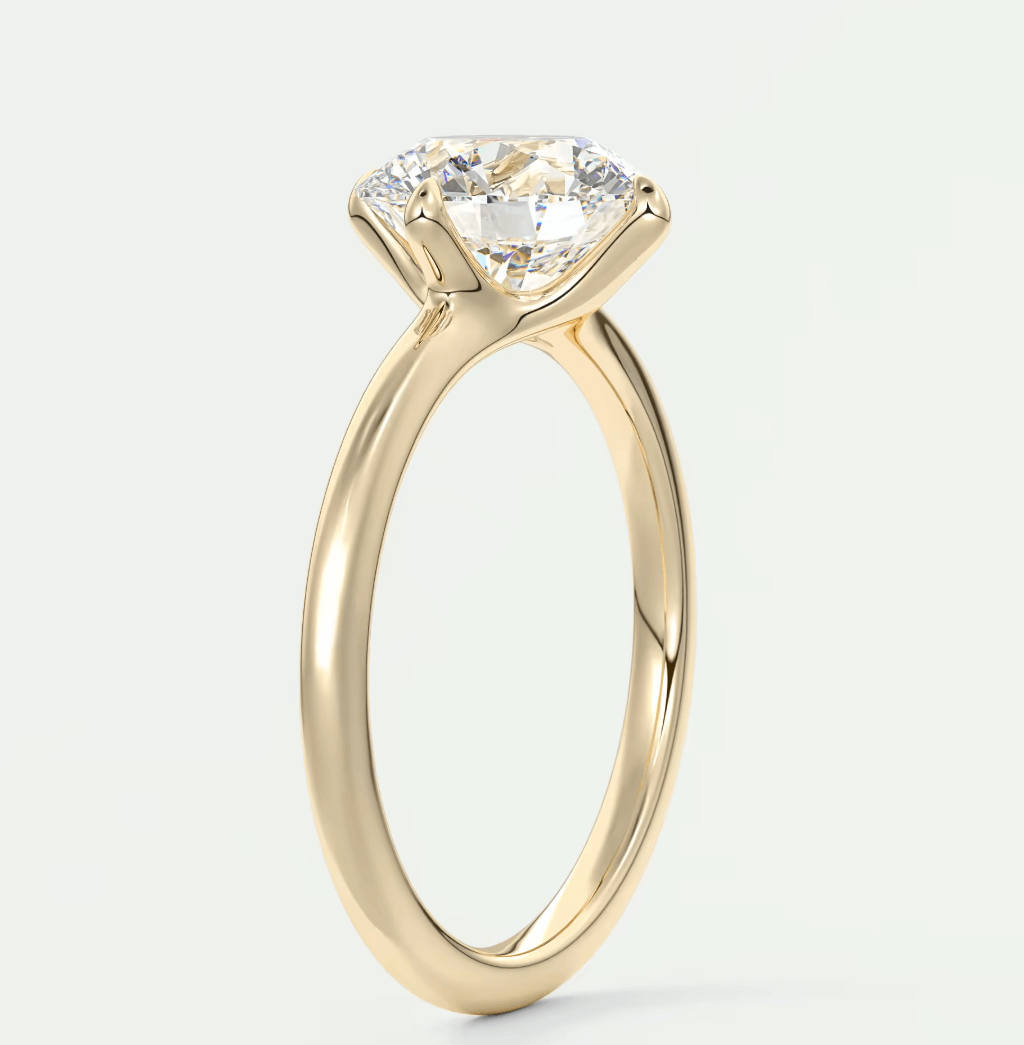 18k yellow gold engagement ring with a princess cut diamond.