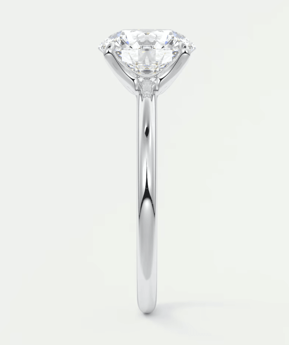 18-karat white gold solitaire diamond engagement ring with a round brilliant cut.