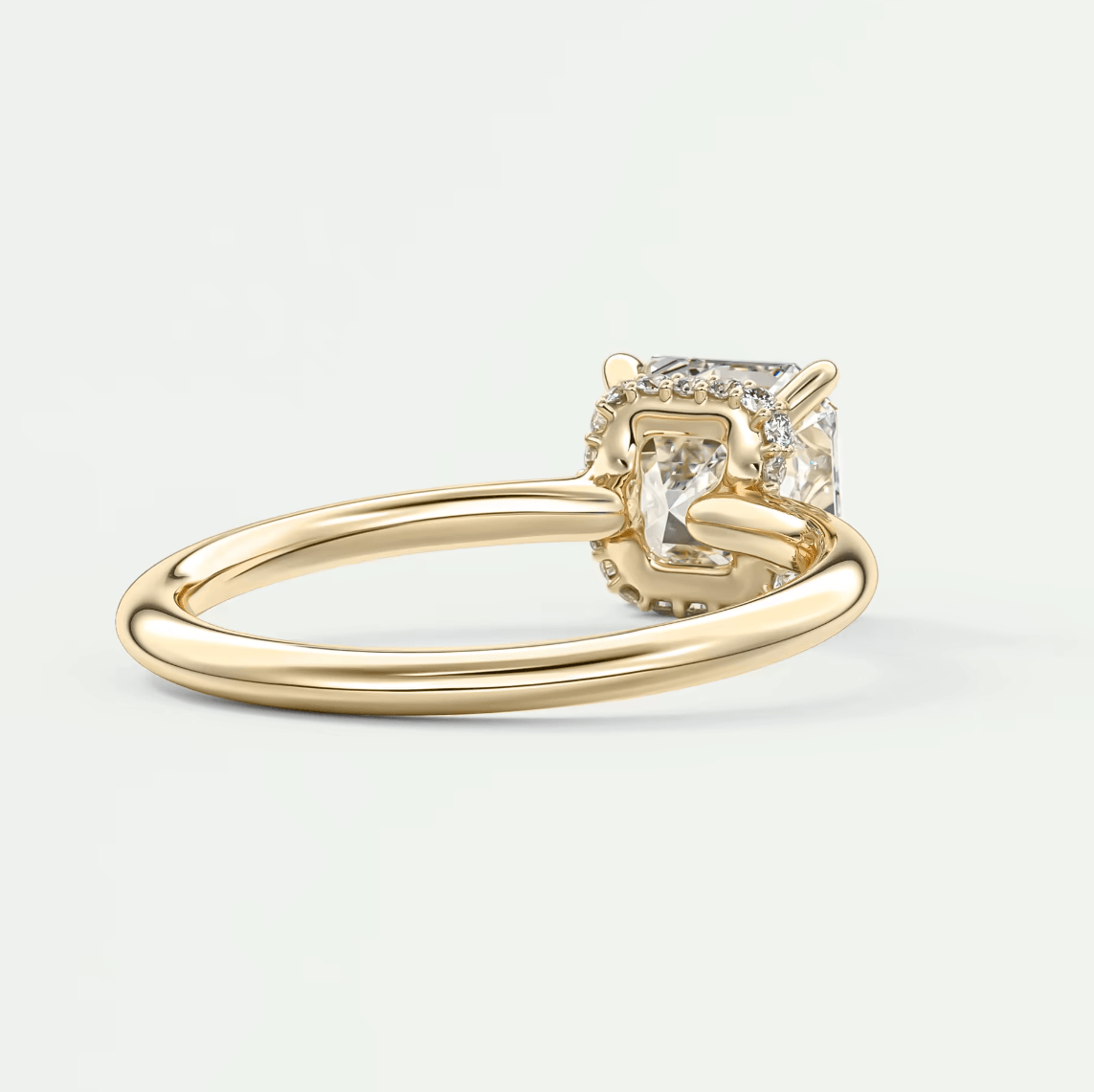 18k yellow gold princess cut diamond engagement ring.