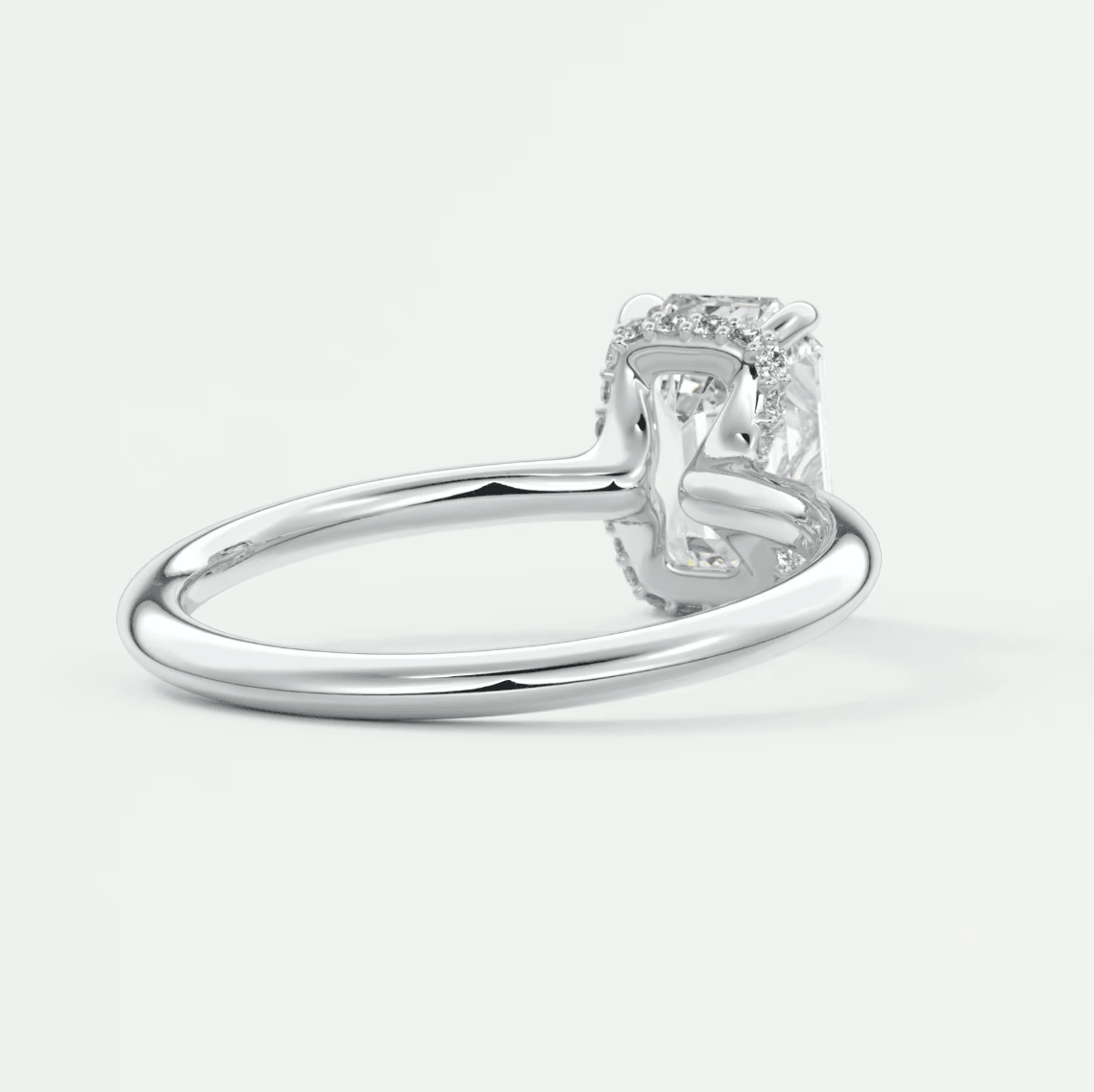 White gold diamond engagement ring with a solitaire design and four-prong setting.