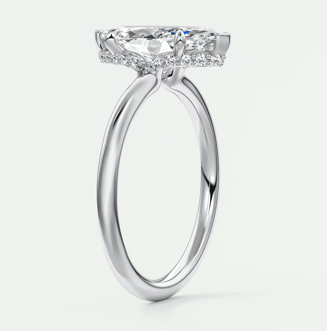 18-karat white gold engagement ring with a princess-cut diamond.