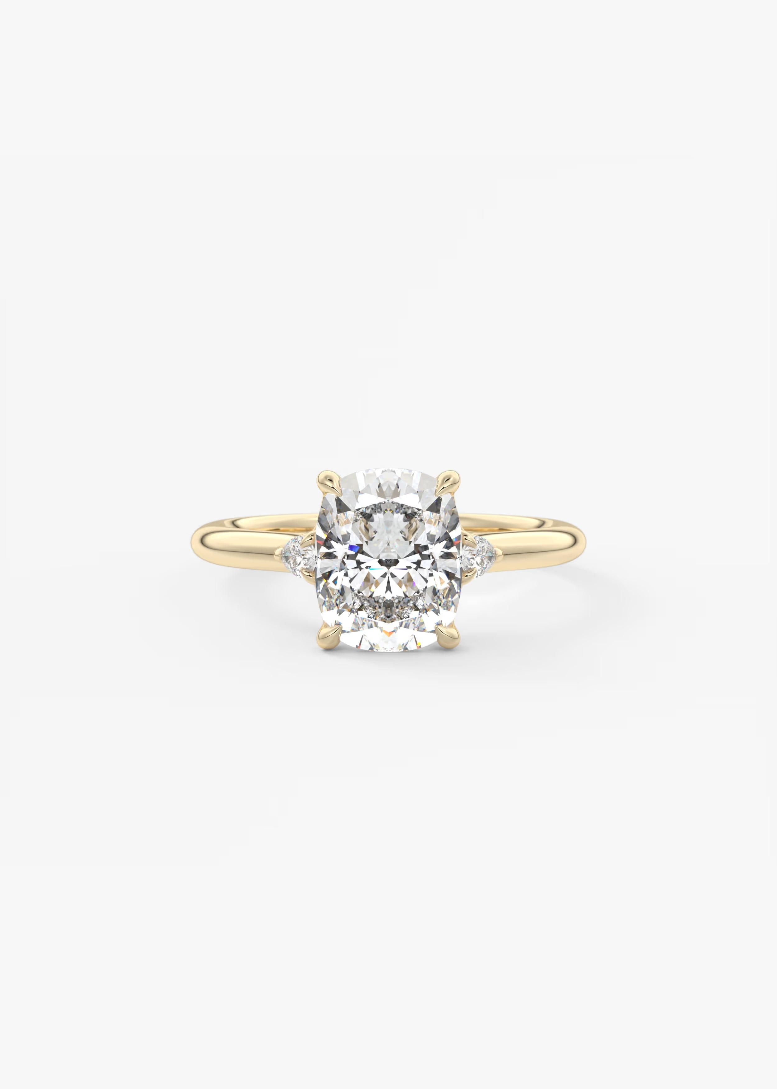 Gold ring with a diamond on a white background