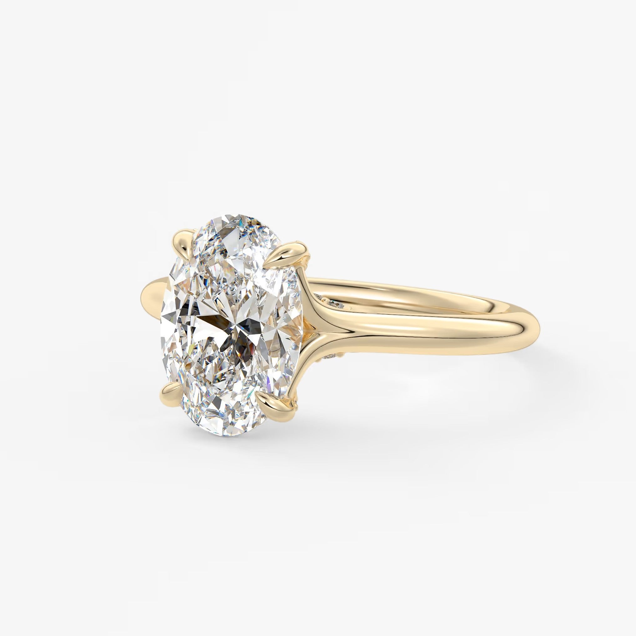 Cassia – oval solitaire with hidden pavé