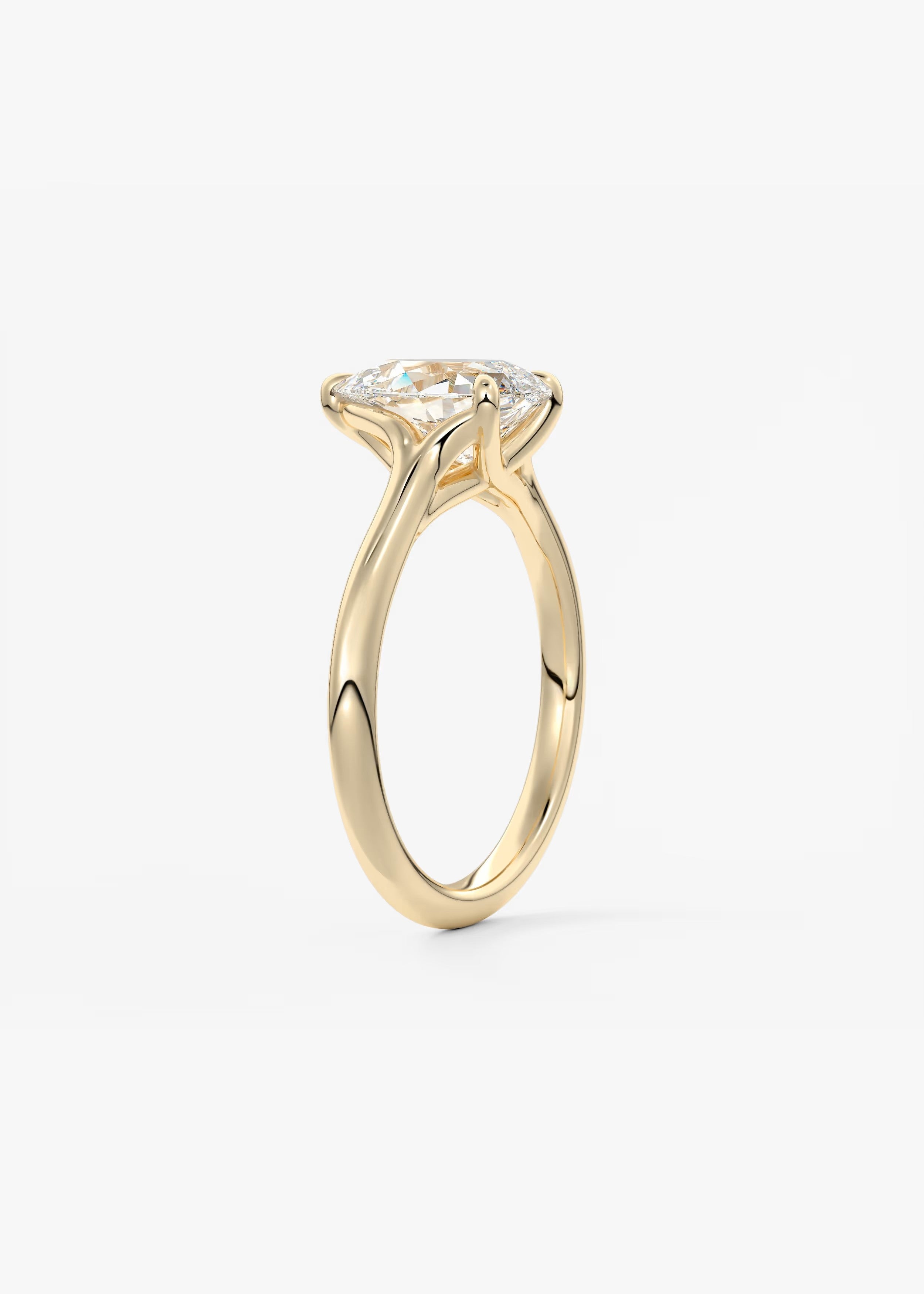 Cassia – Pear Solitaire with Triple-Claw Prongs