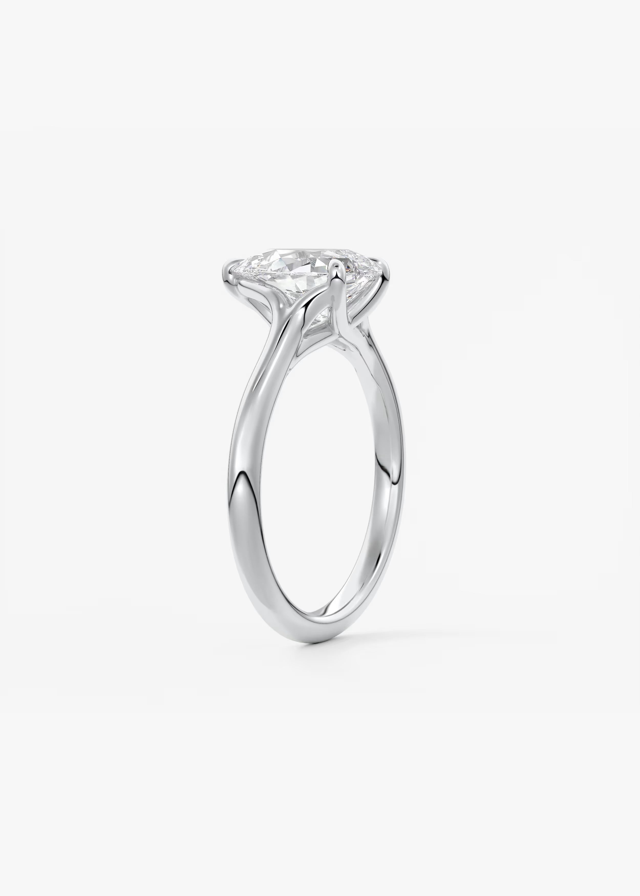 Cassia – Pear Solitaire with Triple-Claw Prongs