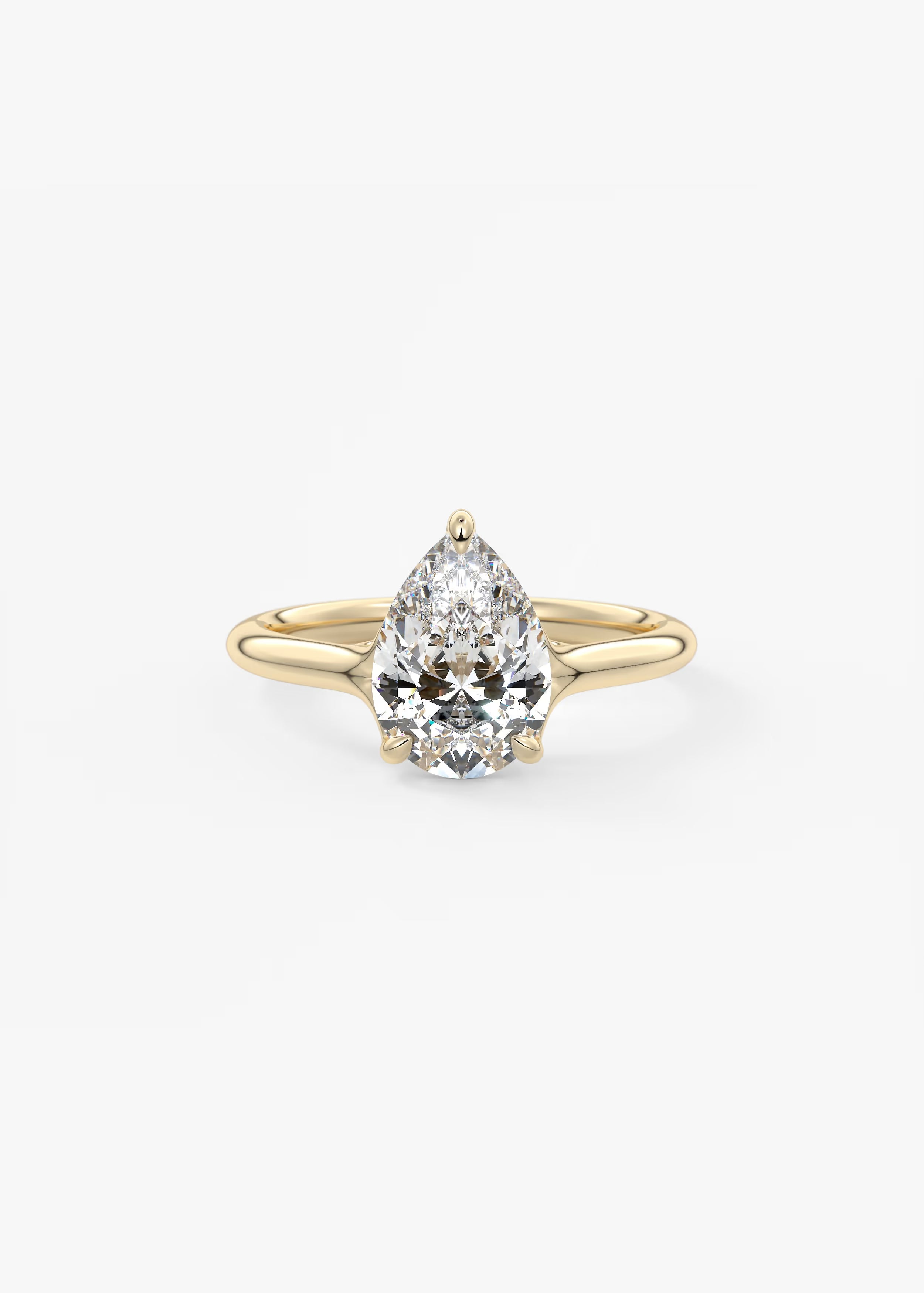 Cassia – Pear Solitaire with Triple-Claw Prongs