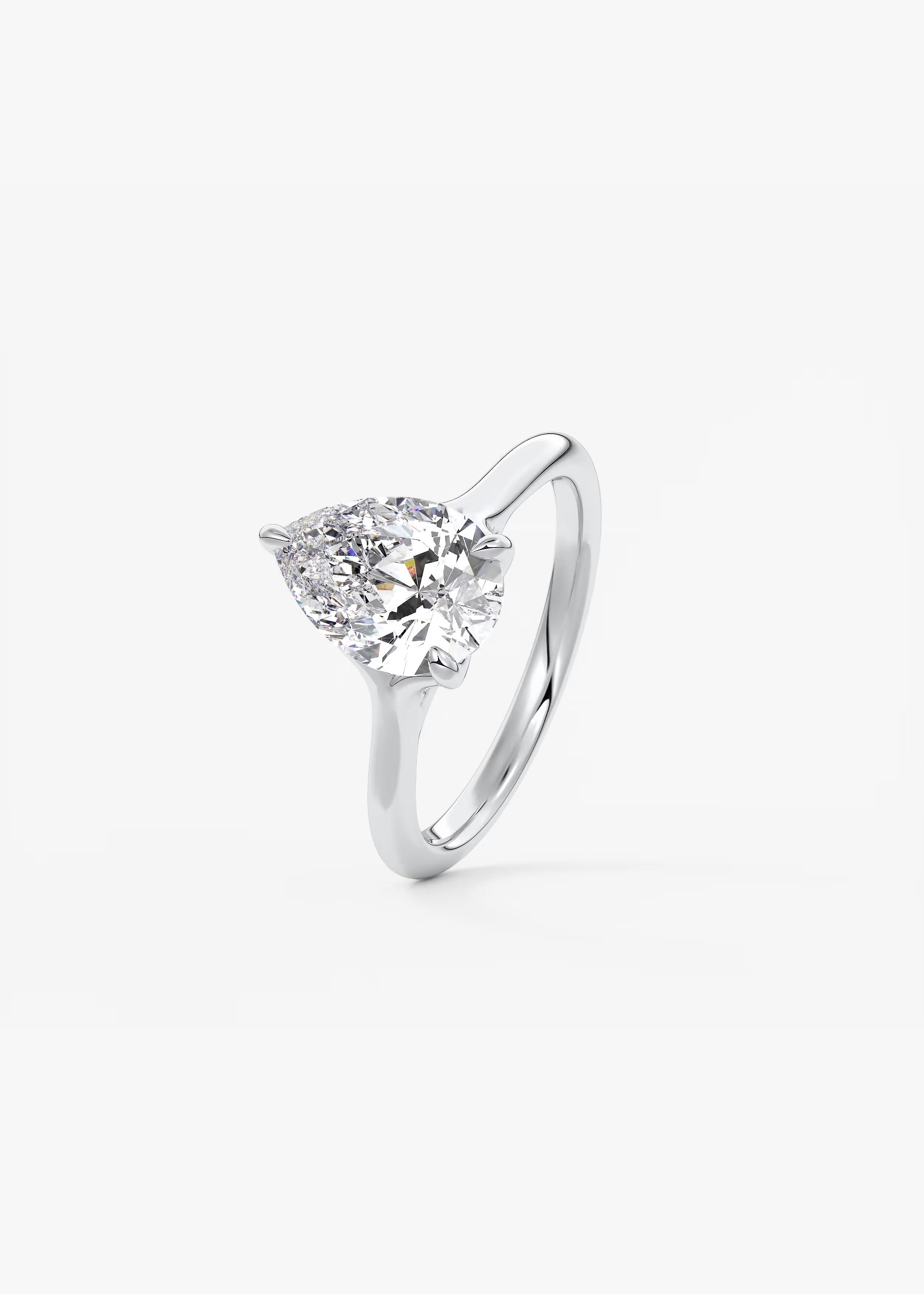 Cassia – Pear Solitaire with Triple-Claw Prongs