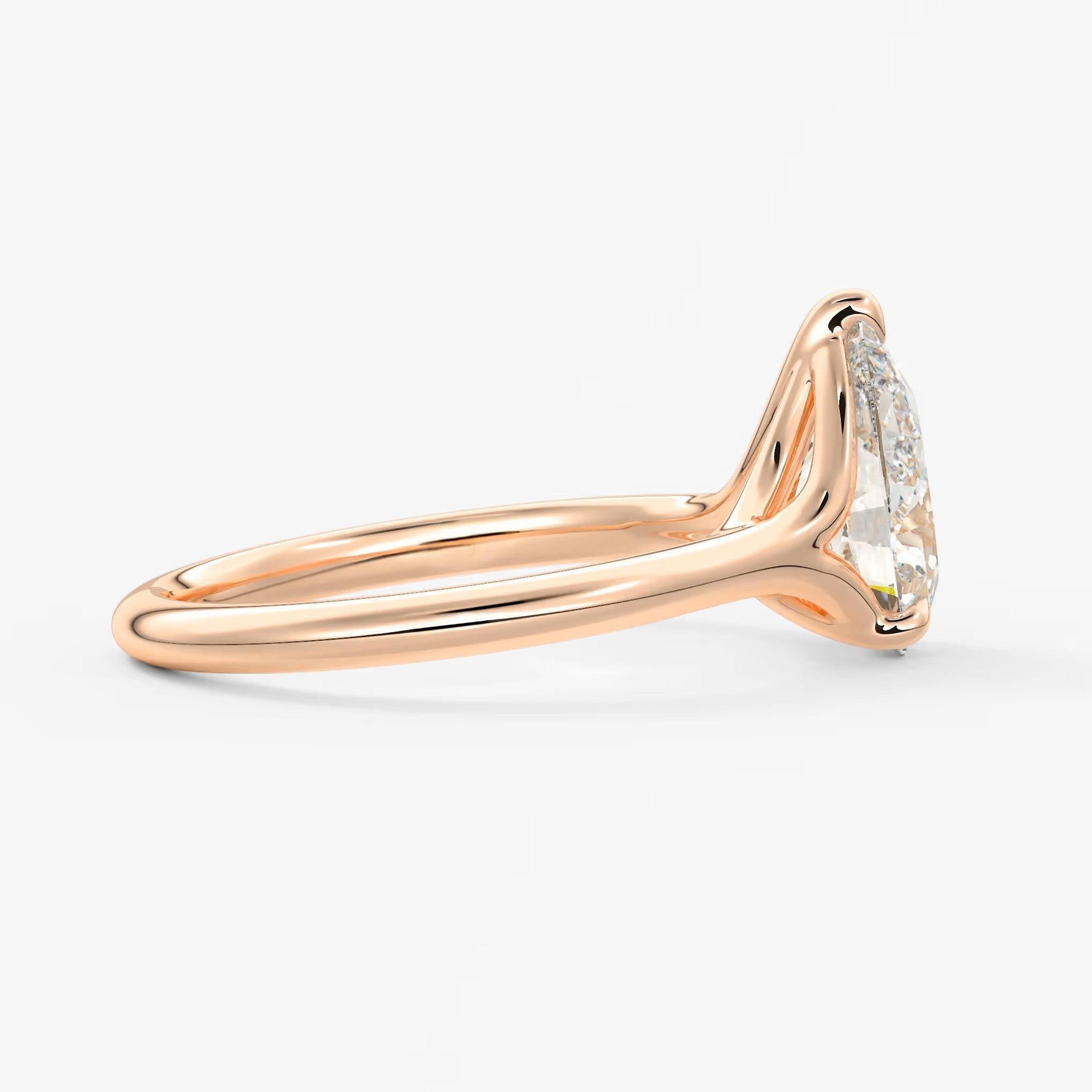 Cassia – pear solitaire with triple-claw prongs