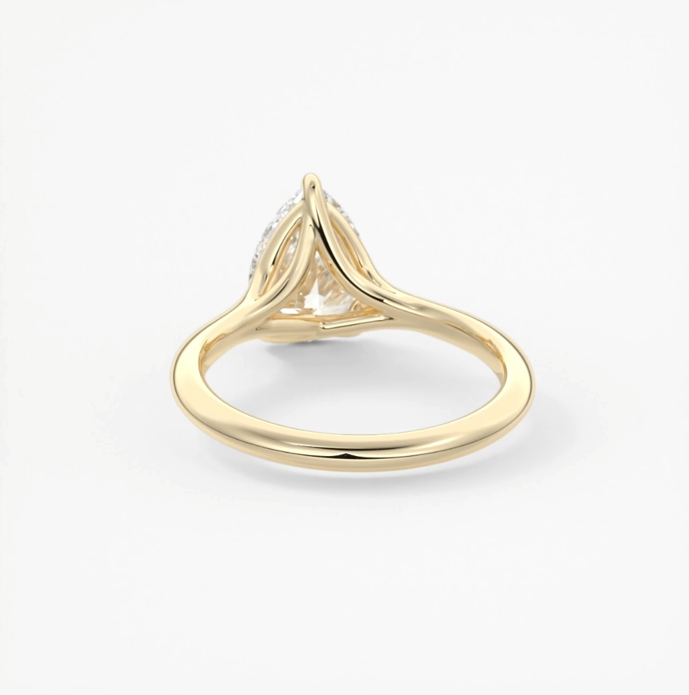 Cassia – pear solitaire with triple-claw prongs