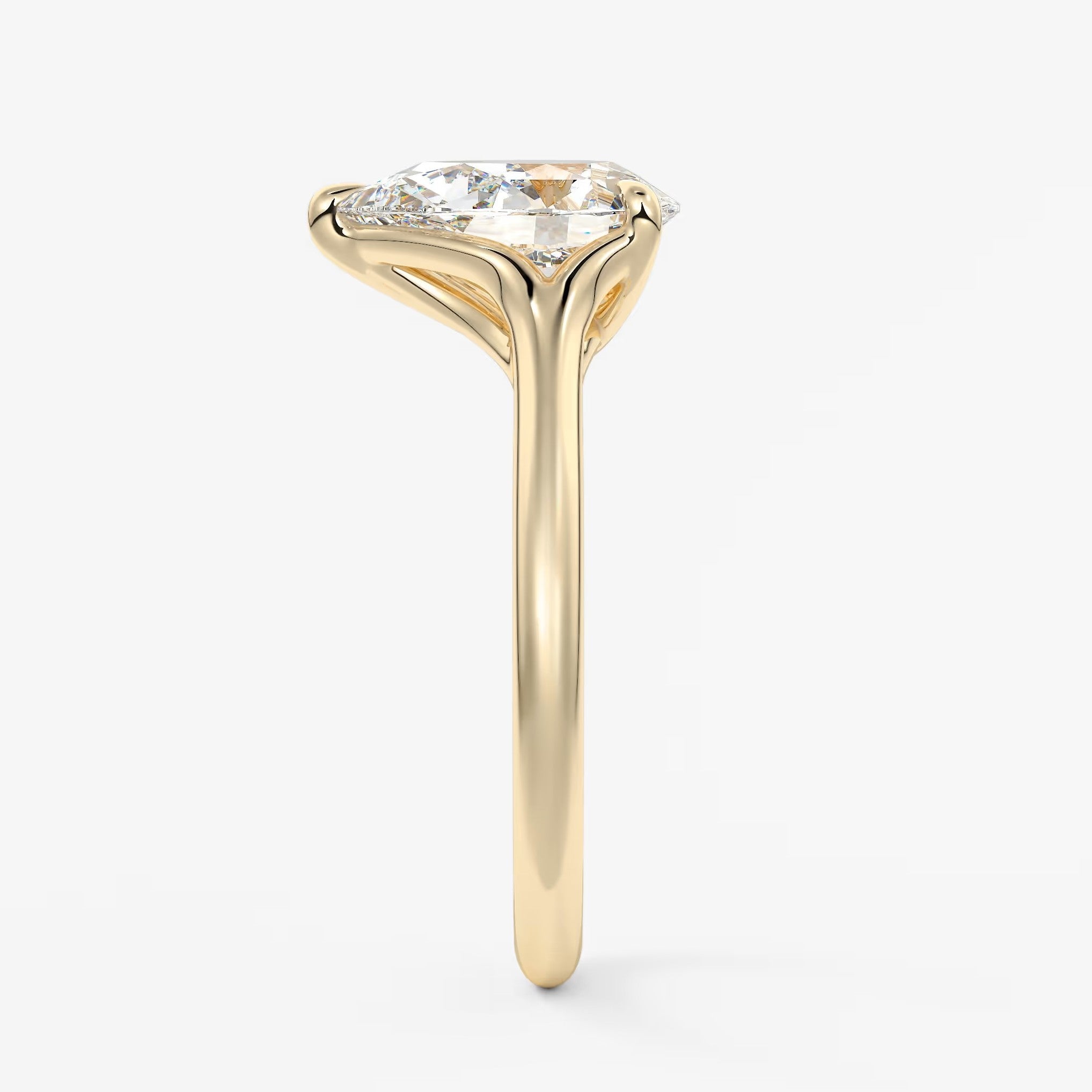 Cassia – pear solitaire with triple-claw prongs