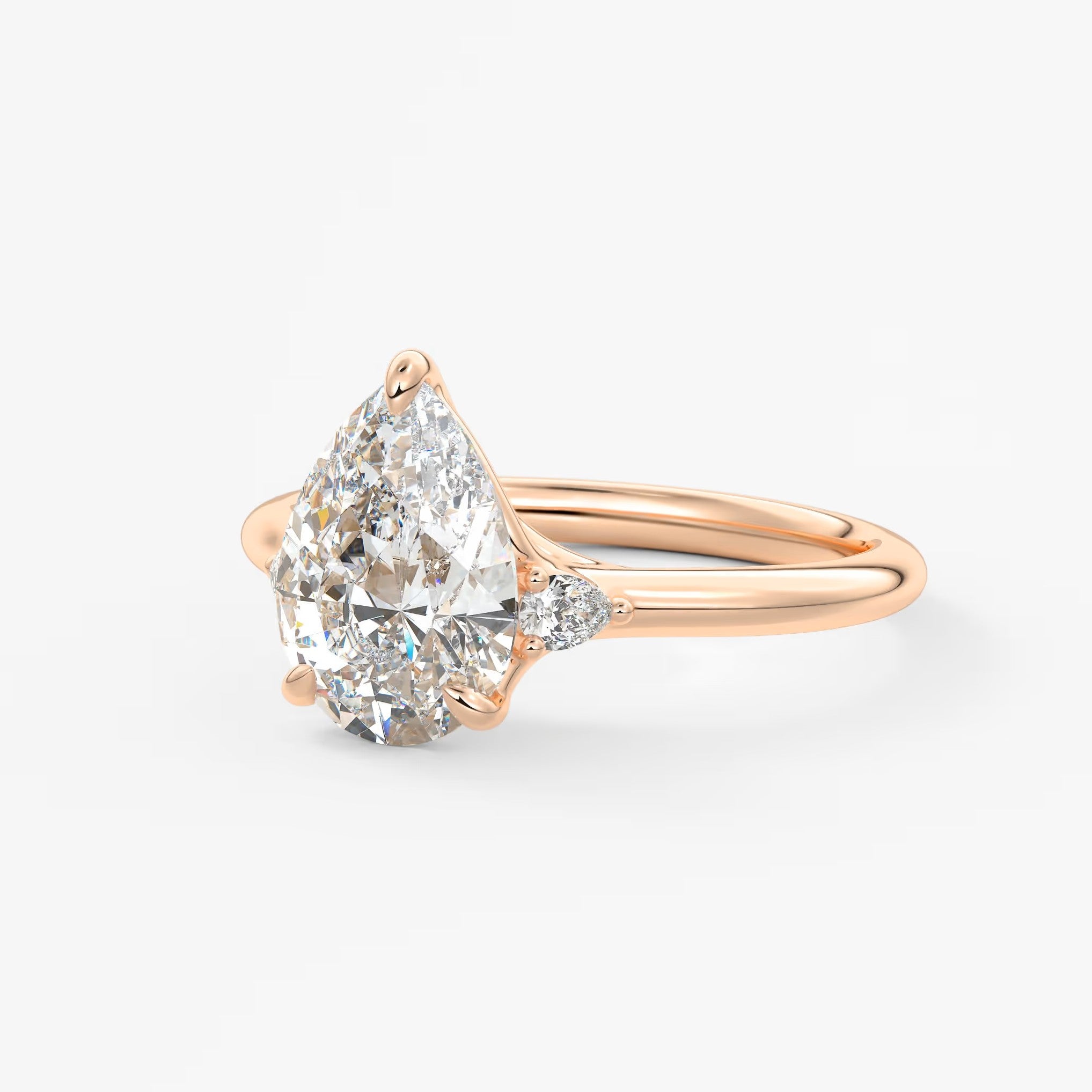 Cassia – pear trilogy with pear side stones