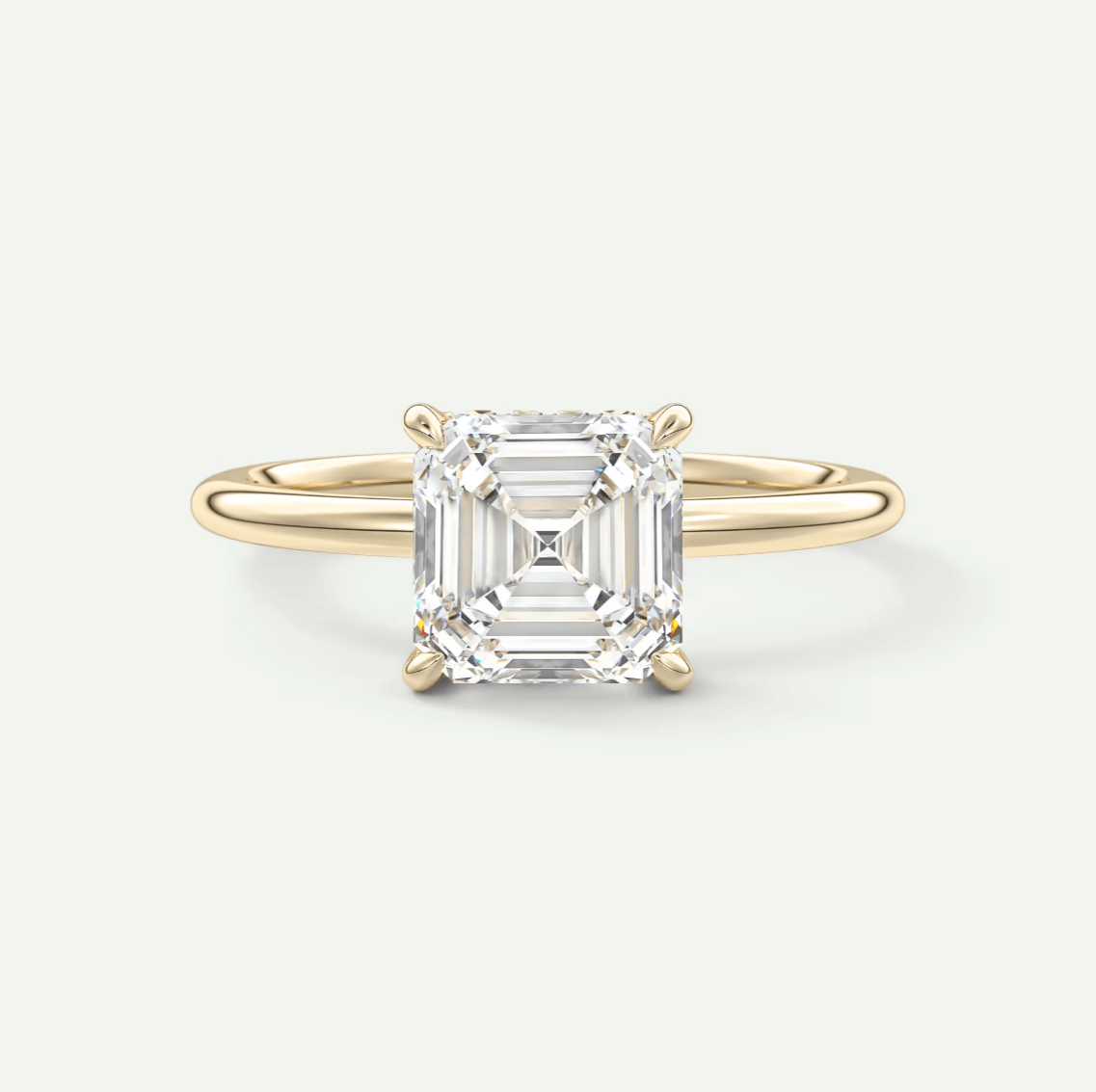 18k yellow gold asscher cut diamond engagement ring.