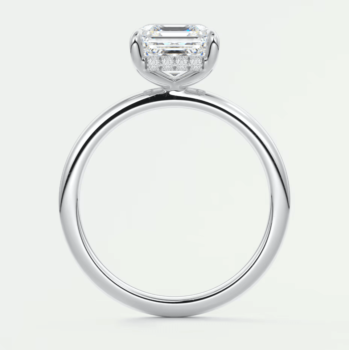 18k white gold engagement ring with a princess cut diamond.