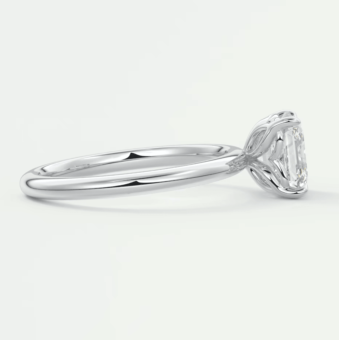 18k white gold emerald cut diamond engagement ring.
