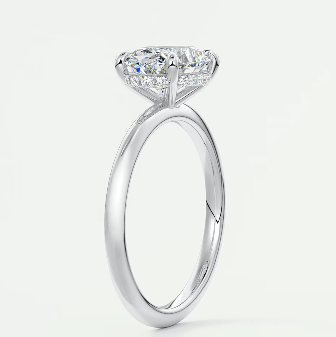 18-karat white gold engagement ring with a princess-cut diamond.