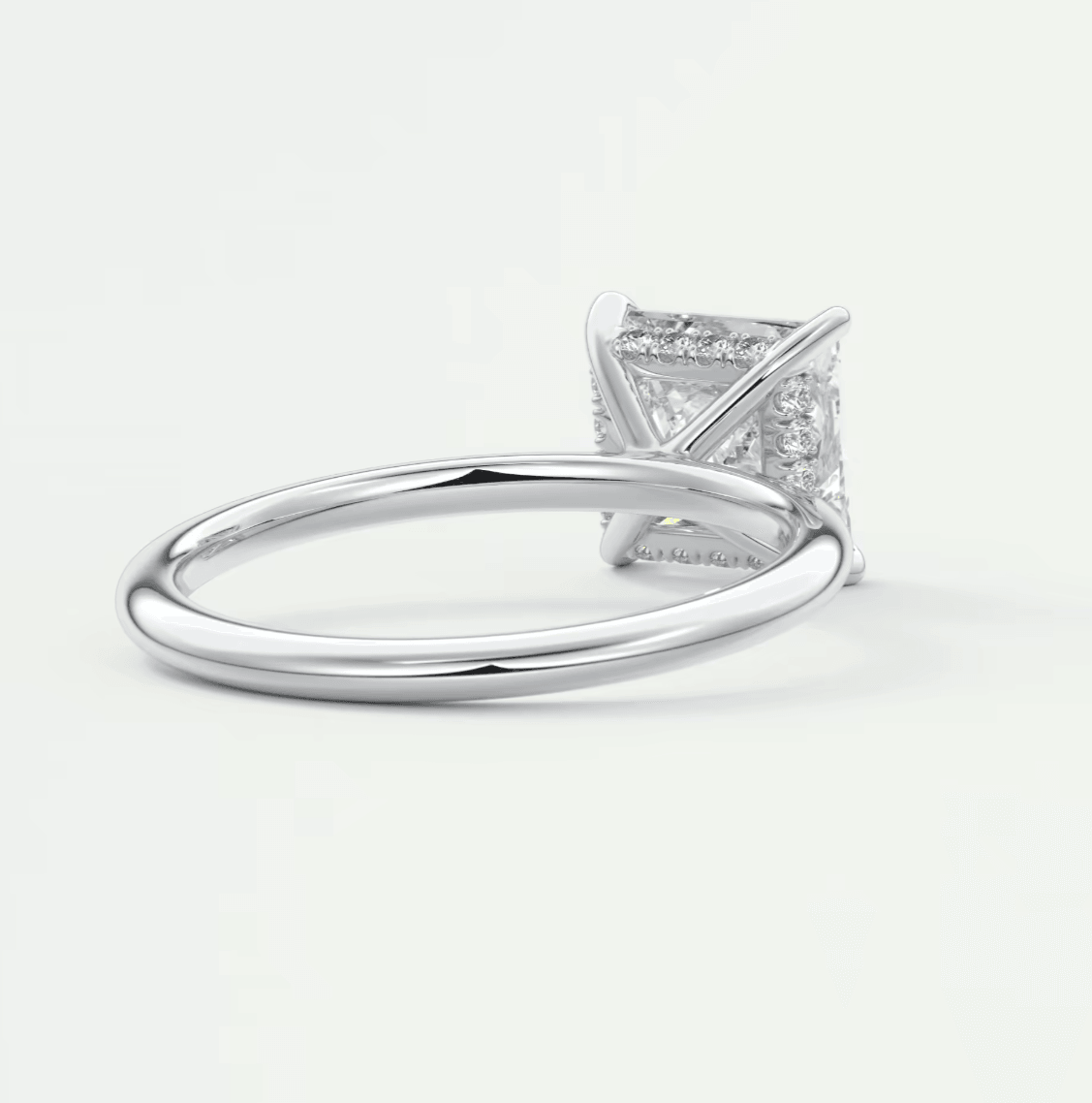 Princess cut diamond engagement ring with white gold band.