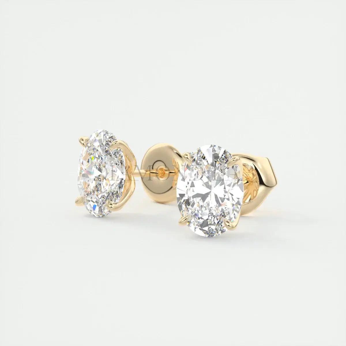 14k yellow gold diamond stud earrings.
