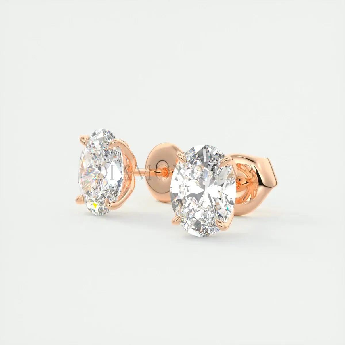 Rose gold diamond stud earrings with oval-cut diamonds