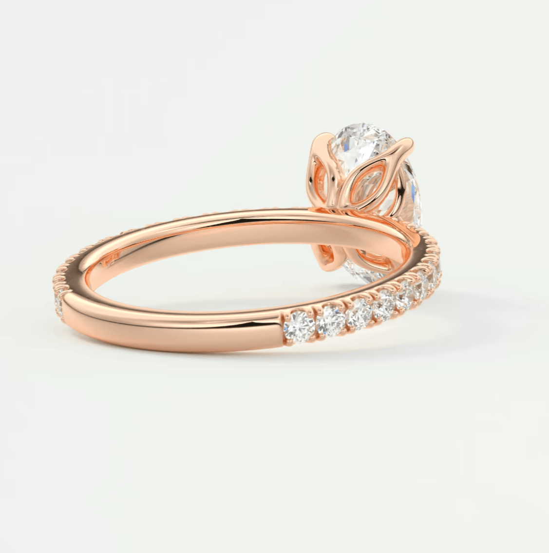 Rose gold owl engagement ring with diamond accents
