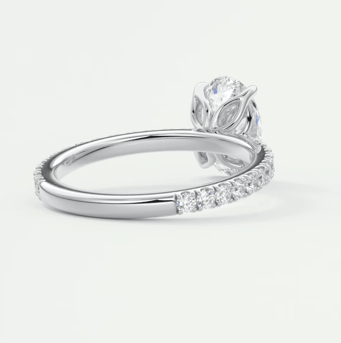 White gold diamond engagement ring with a rose design.