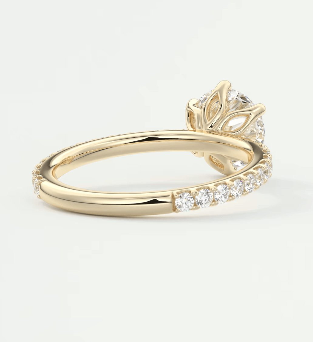 18k yellow gold diamond engagement ring with a rose design.
