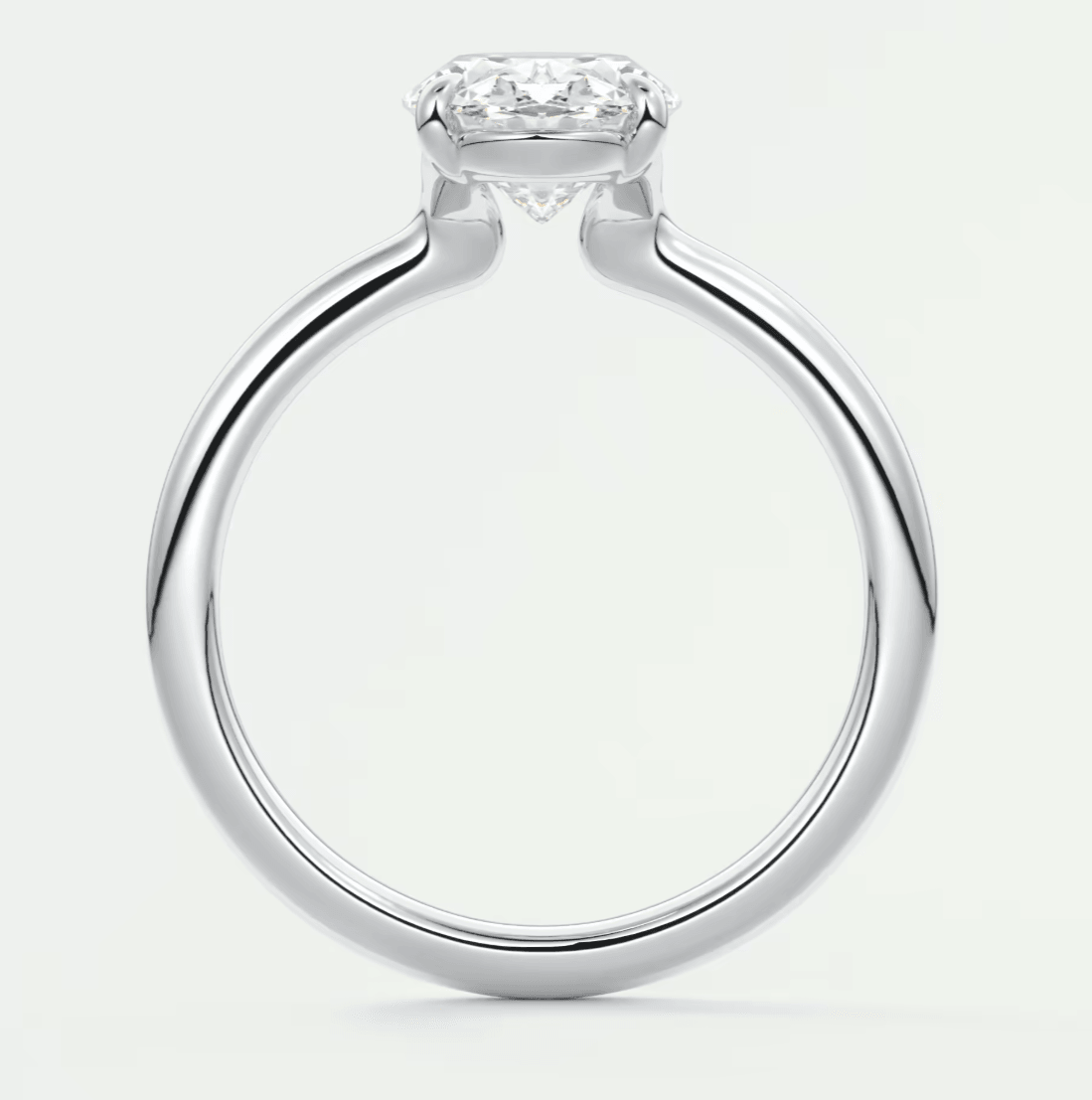 Silver diamond engagement ring with a classic solitaire design.