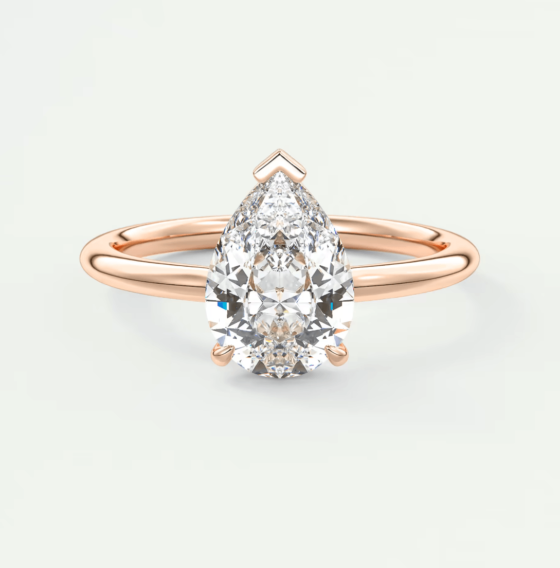 Elysian Pear Solitaire Ring – Timeless Elegance with Lab Diamond or Moissanite