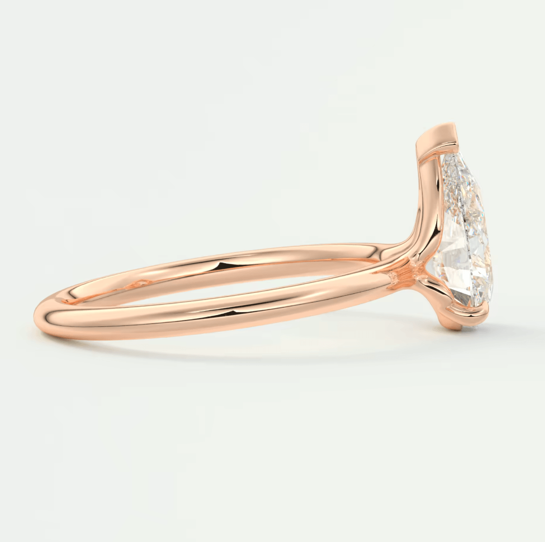 Elysian Pear Solitaire Ring – Timeless Elegance with Lab Diamond or Moissanite