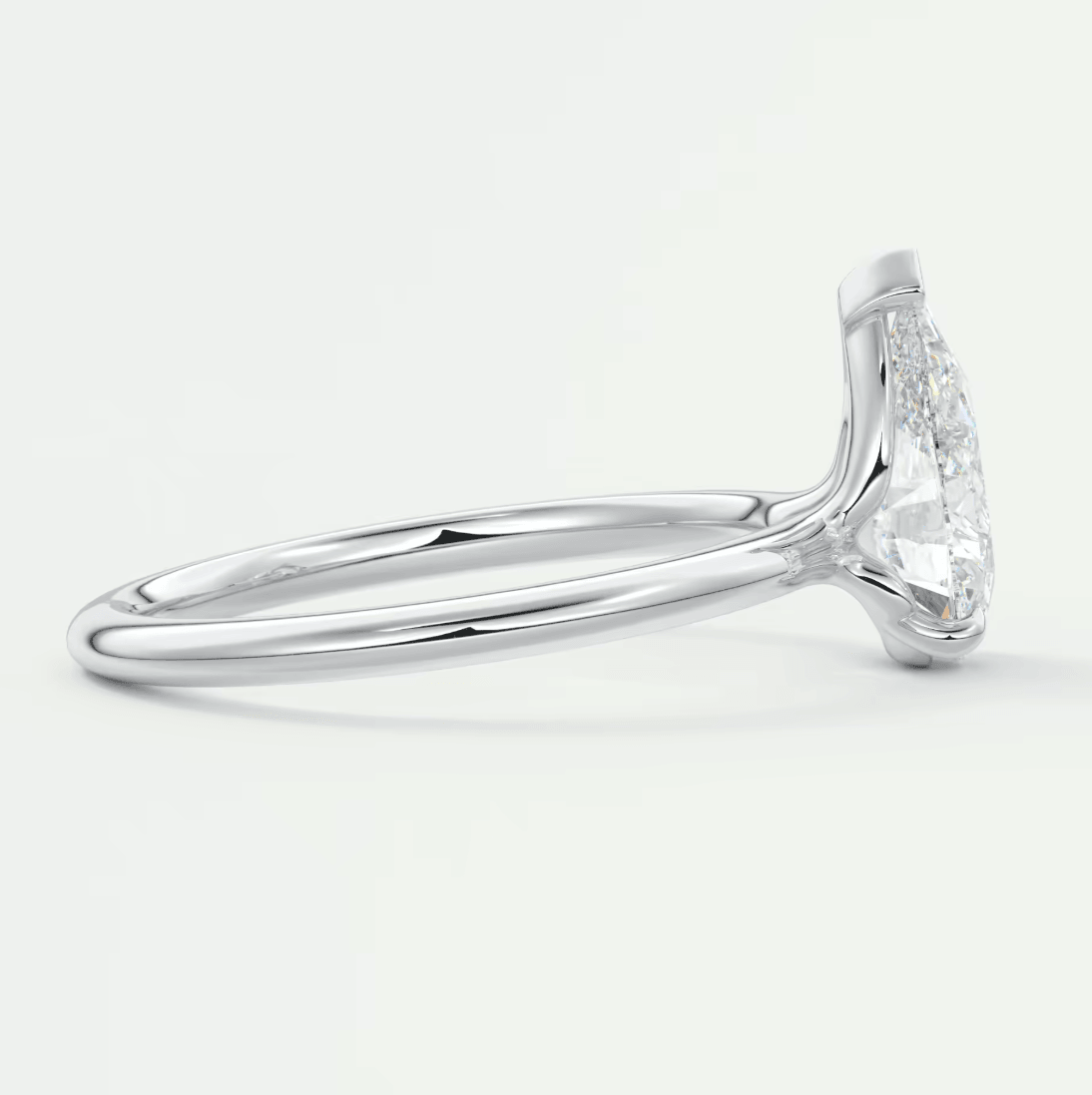 Elysian Pear Solitaire Ring – Timeless Elegance with Lab Diamond or Moissanite