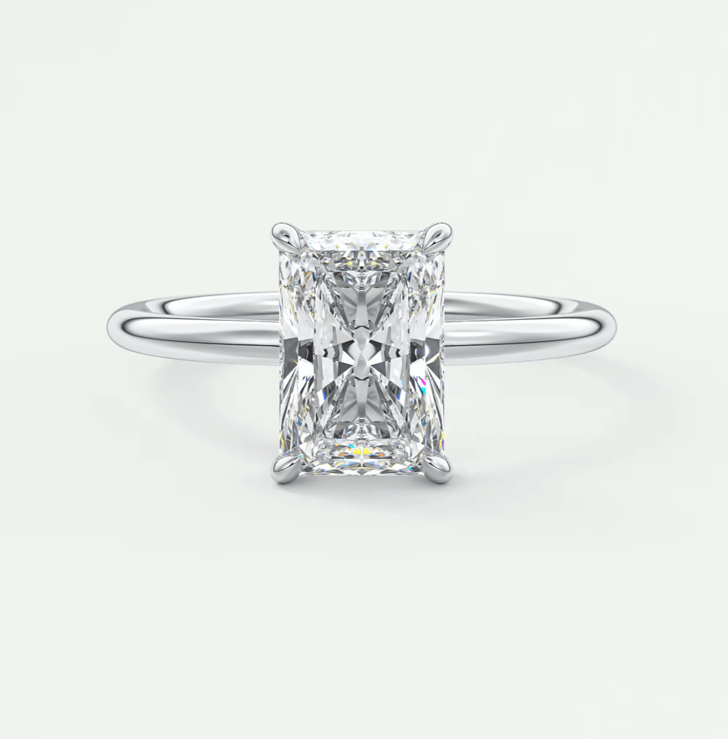 18k white gold emerald cut diamond engagement ring.