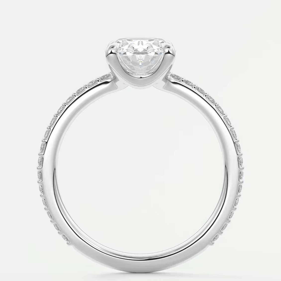 18-karat white gold engagement ring with a princess-cut diamond and pave-set diamonds on the band.