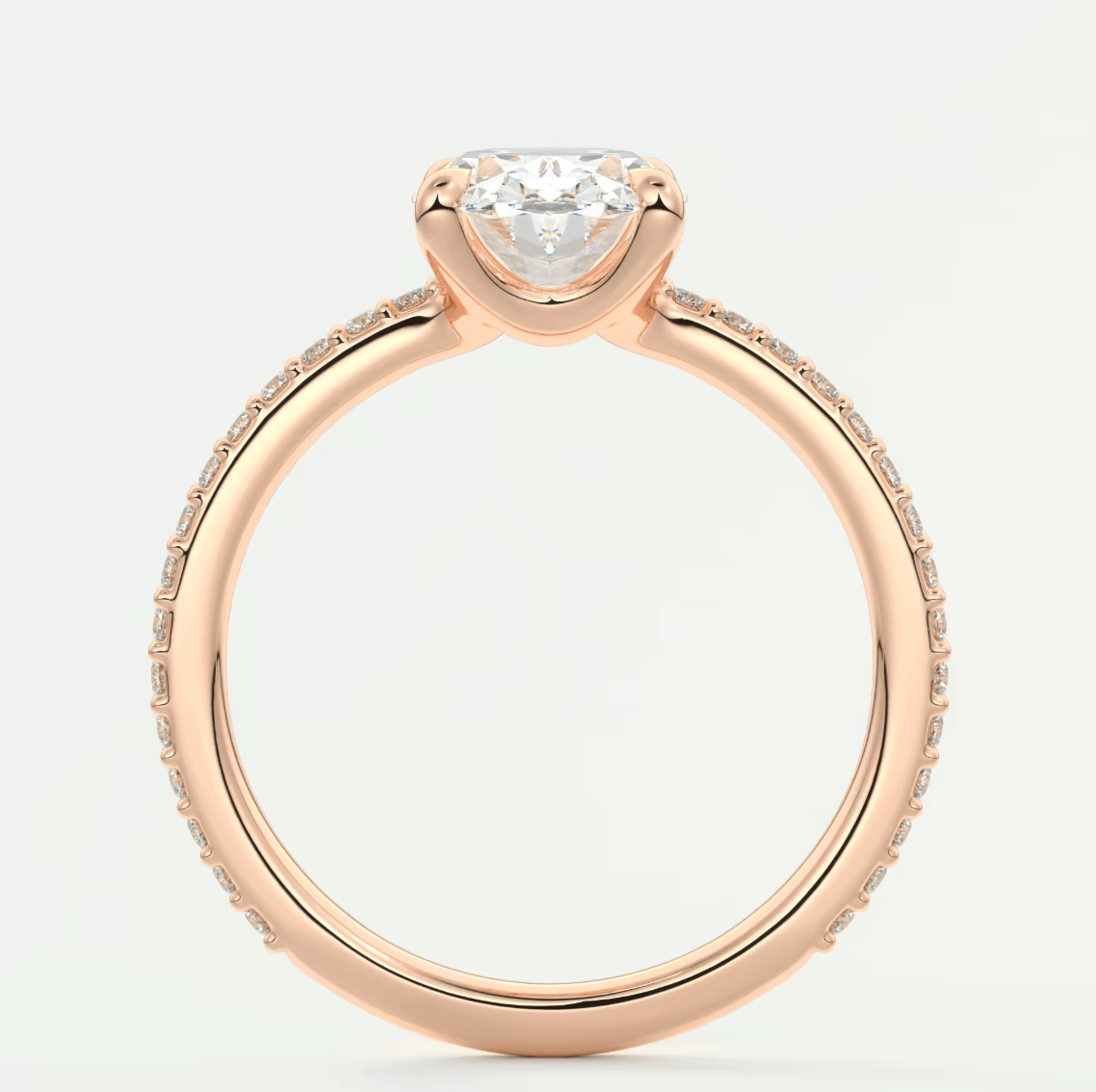 18-karat rose gold engagement ring with a princess-cut diamond and pave-set diamonds on the band.