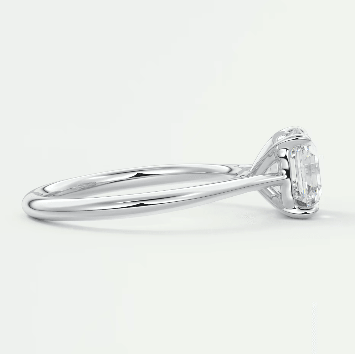 18k white gold engagement ring with a round diamond.