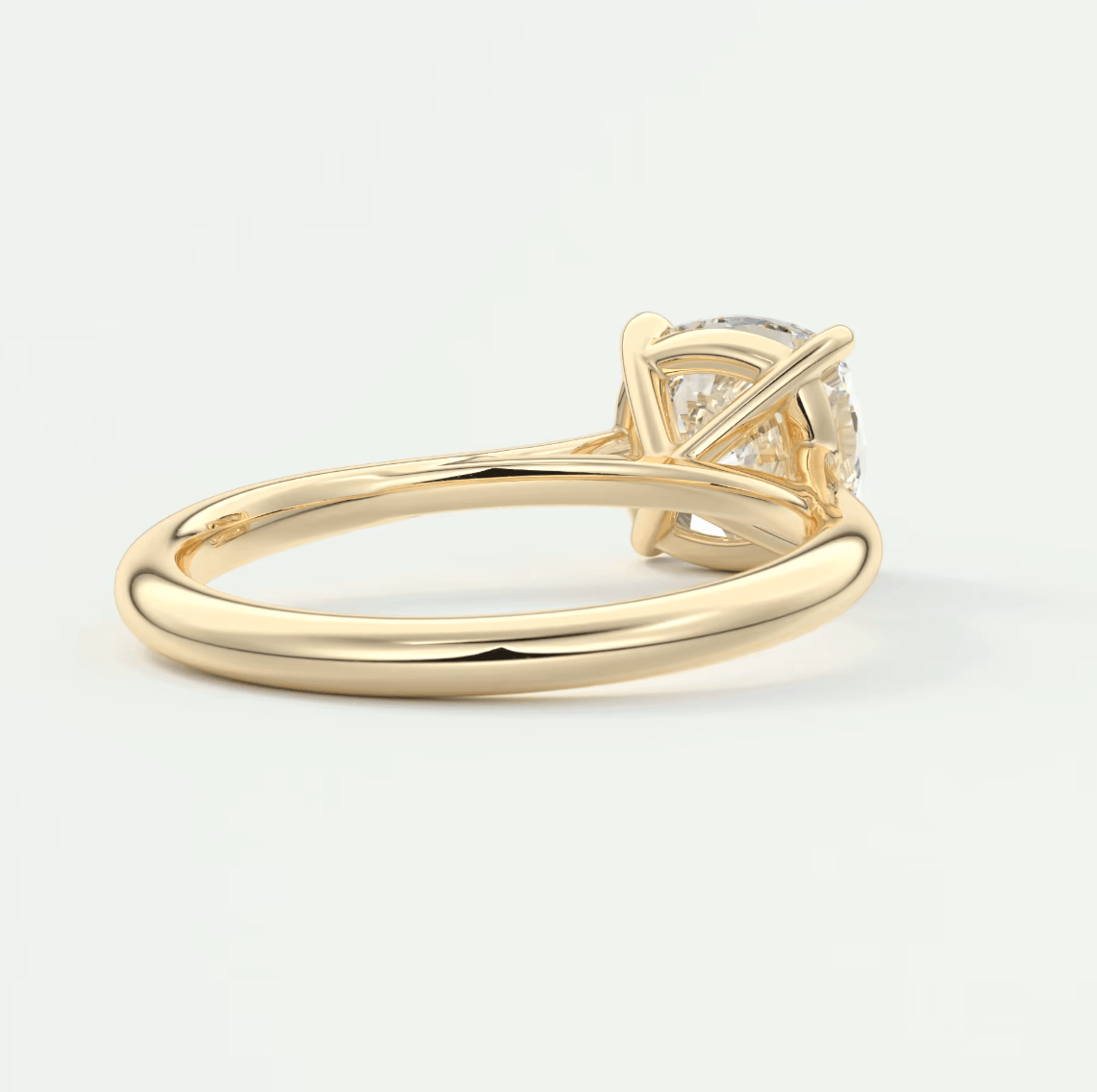 18k yellow gold engagement ring with a princess cut diamond.