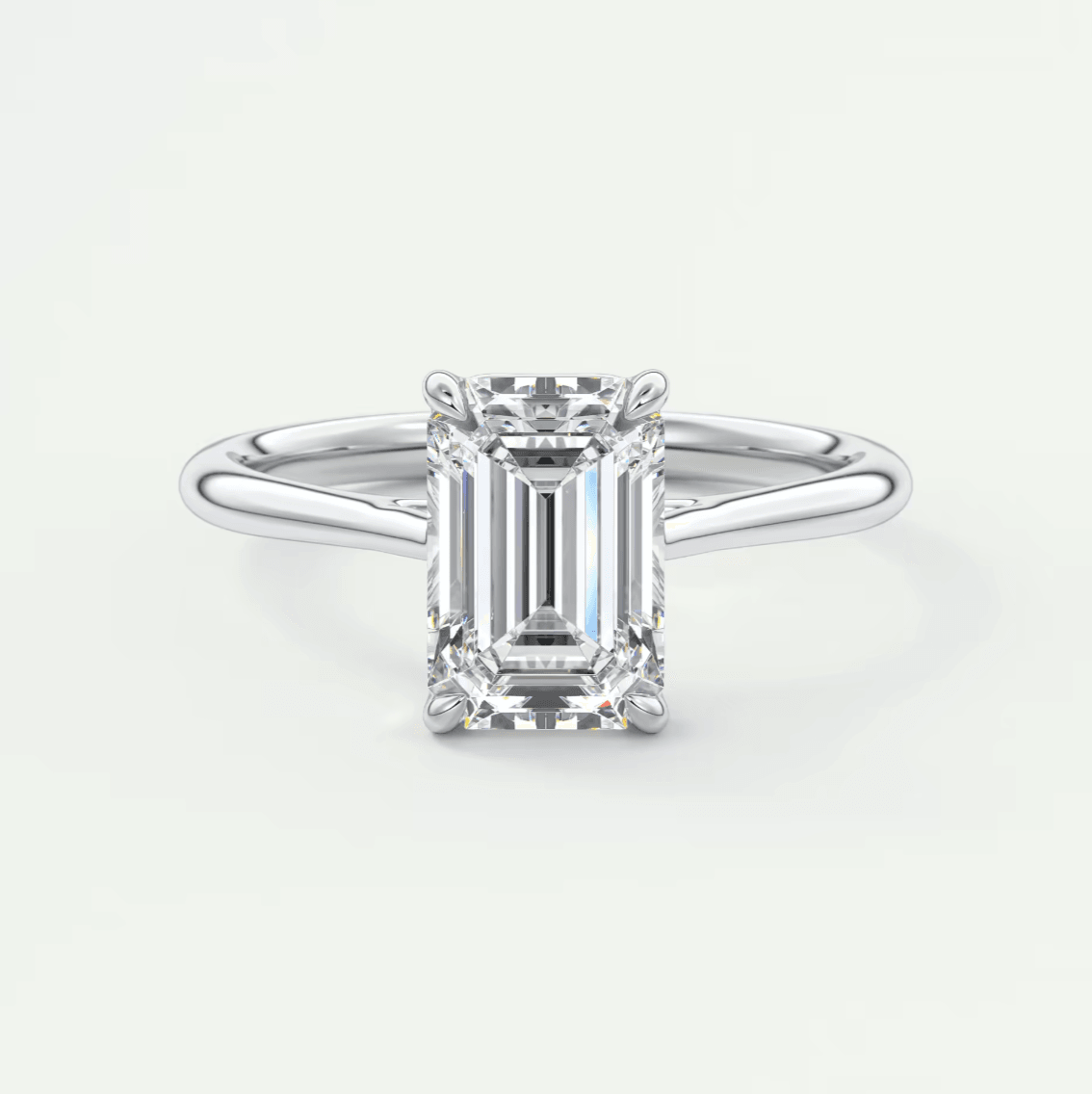 18k white gold emerald cut diamond engagement ring.