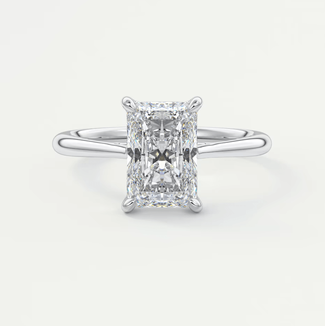 18k white gold emerald cut diamond engagement ring.