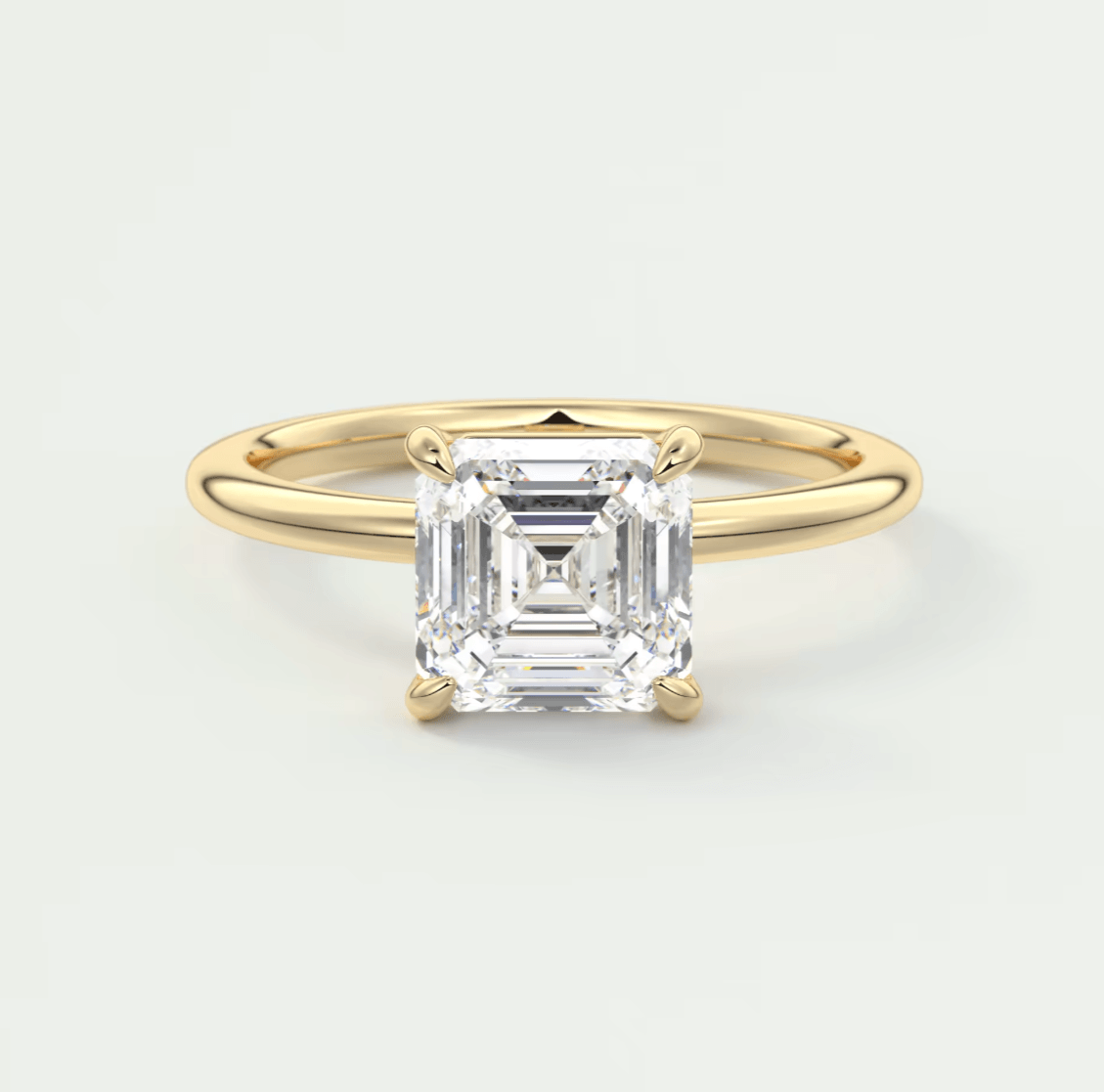 18k yellow gold asscher cut diamond engagement ring.