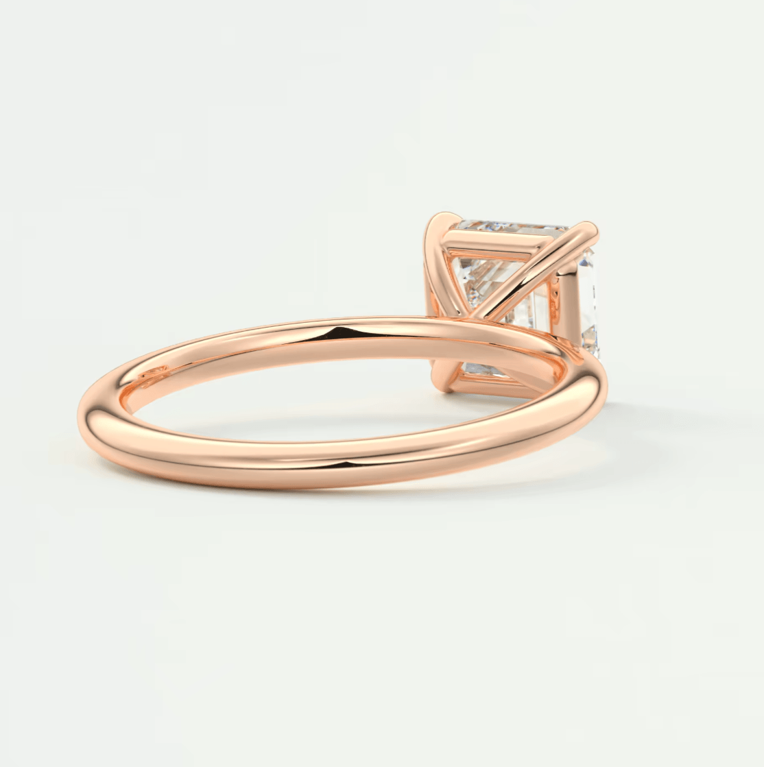 18k rose gold princess cut diamond engagement ring.