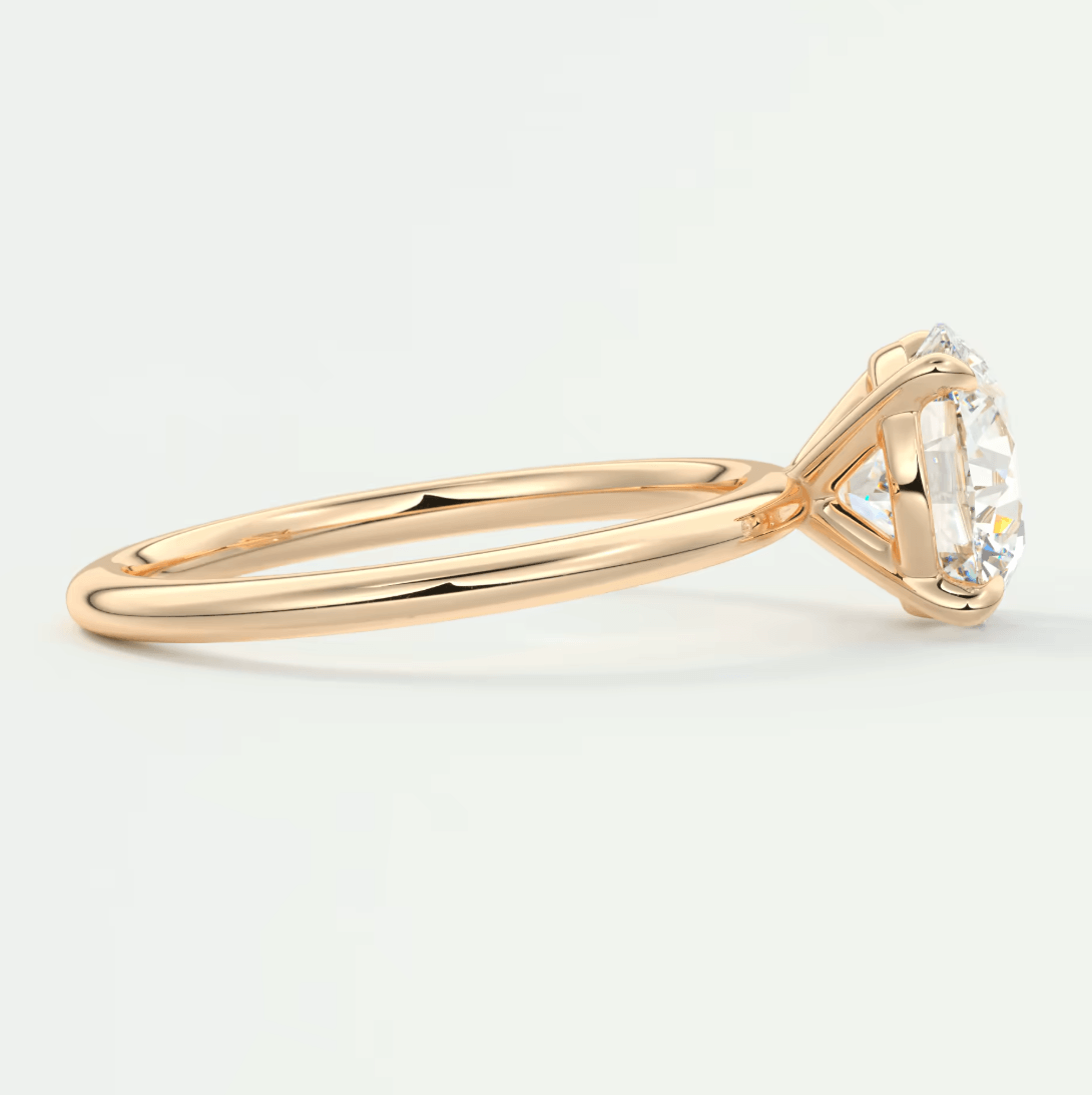 18k gold engagement ring with a princess cut diamond.