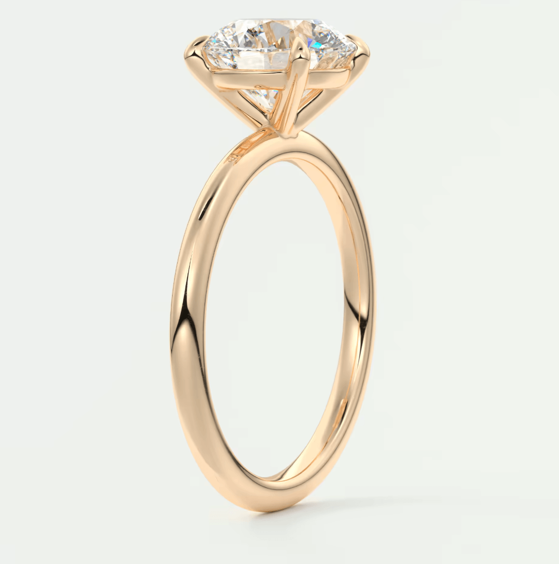 18-karat rose gold engagement ring with a princess-cut diamond.