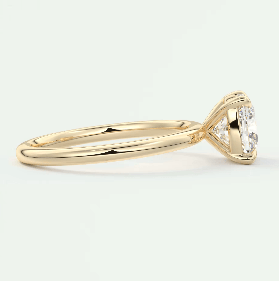 18k yellow gold engagement ring with a princess cut diamond.