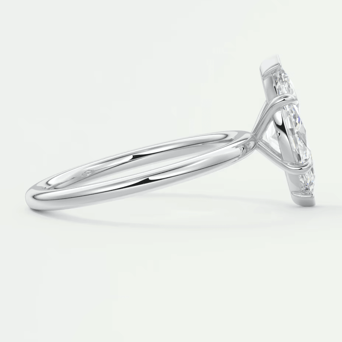 White gold diamond engagement ring with a solitaire setting.