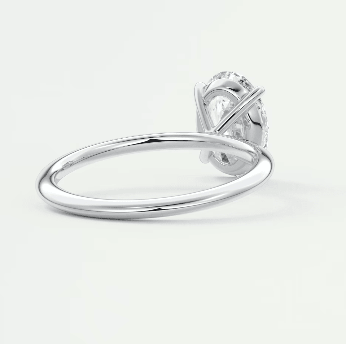 Silver diamond engagement ring with a classic solitaire design.