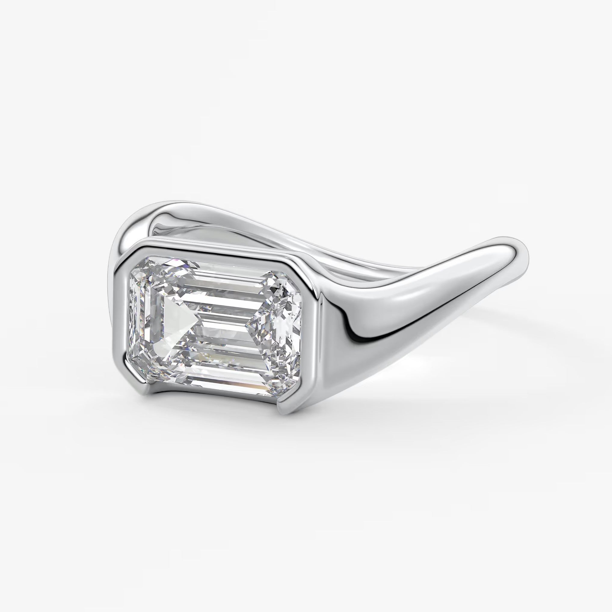 Lyra – east-west half bezel emerald engagement ring